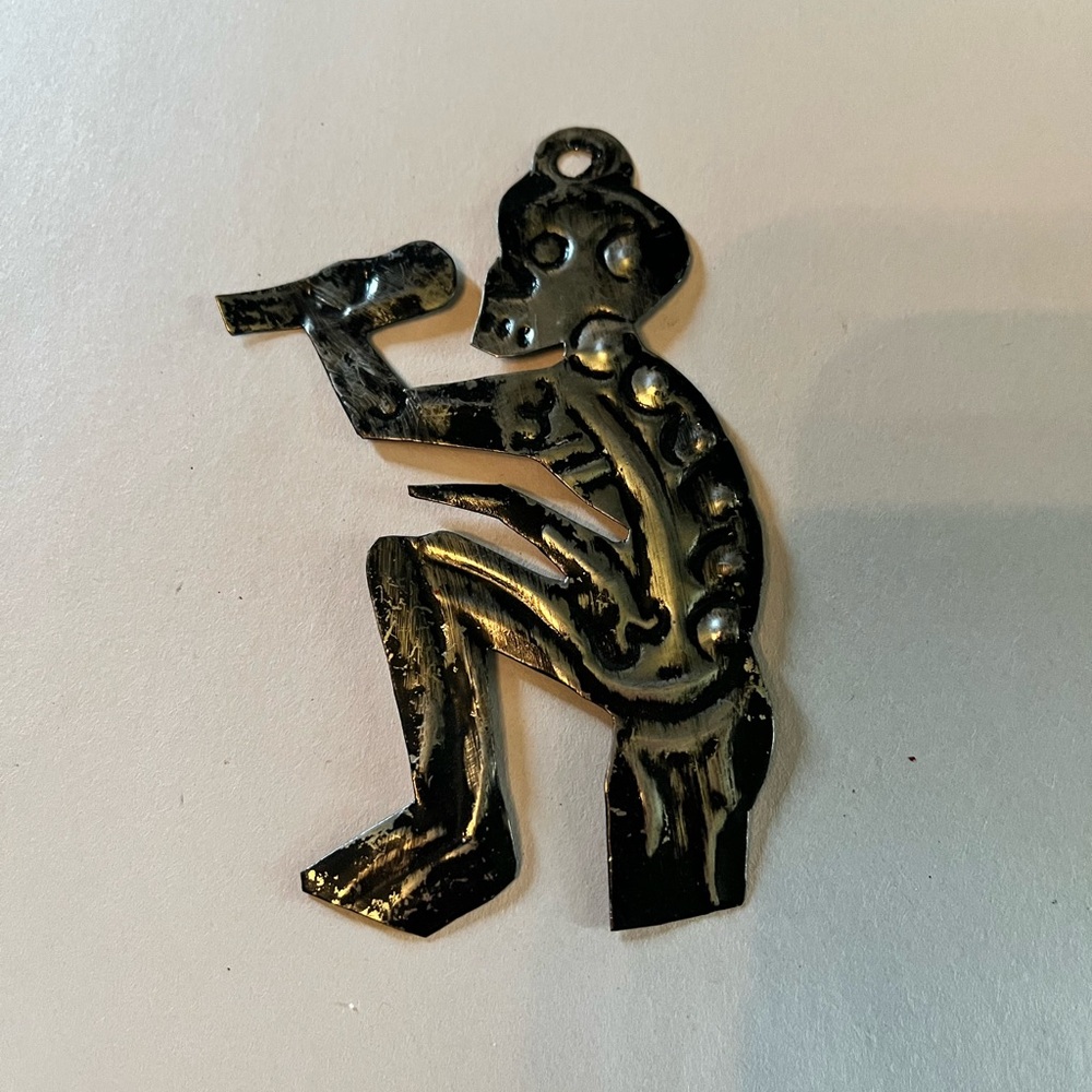 Hand painted Mexican tin art skeleton